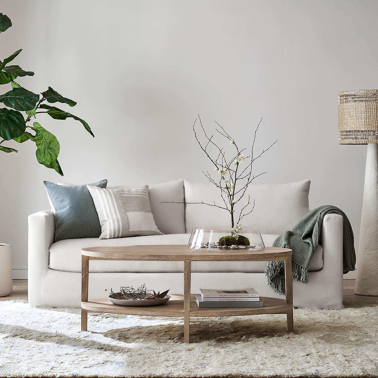 Clairemont Natural Oak Wood 48" Oval Coffee Table with Shelf