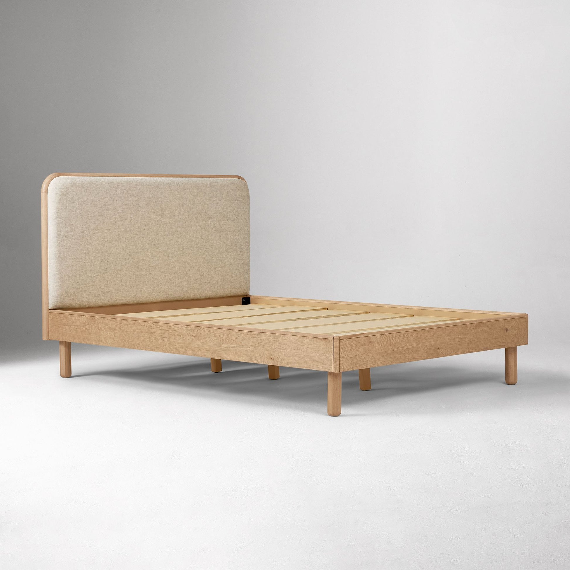 Miles Wood & Upholstered Bed